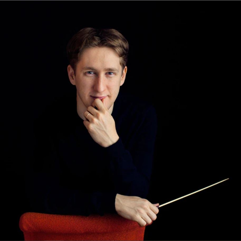 Portrait of Joshua Weilerstein with baton