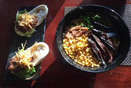 Ramen bowl and chashu buns at Sakuramen